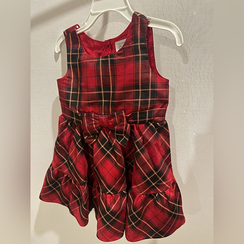 Holiday dress in red, black, and gold